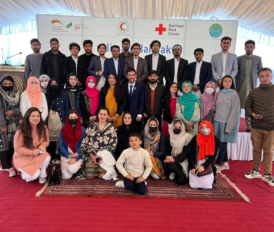Participants at a Climate Bethaak gathering, photographed in front of the event backdrop.